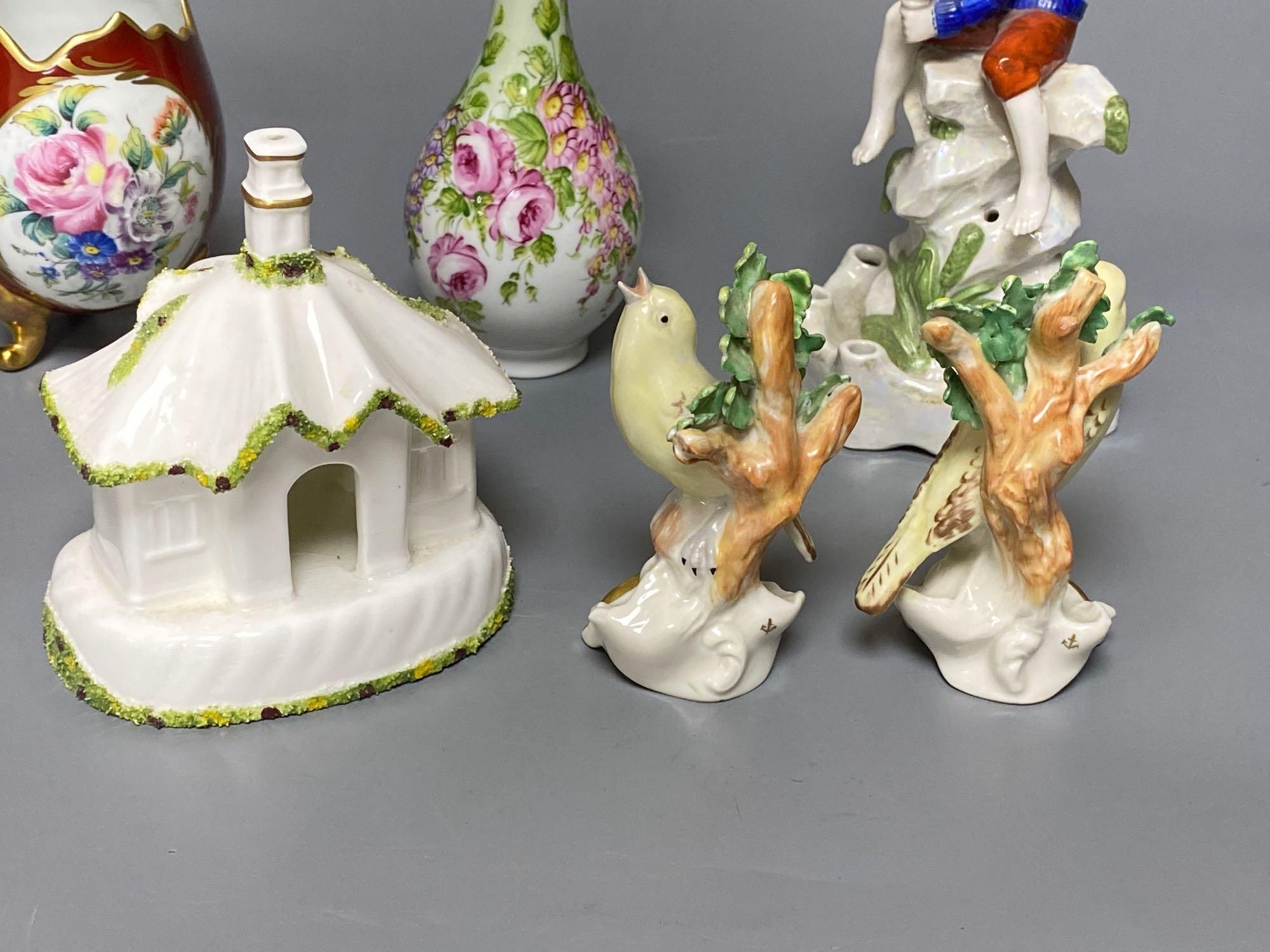 A Sitzendorf figure Fisher boy, a Coalport cottage and Continental ceramics (6)